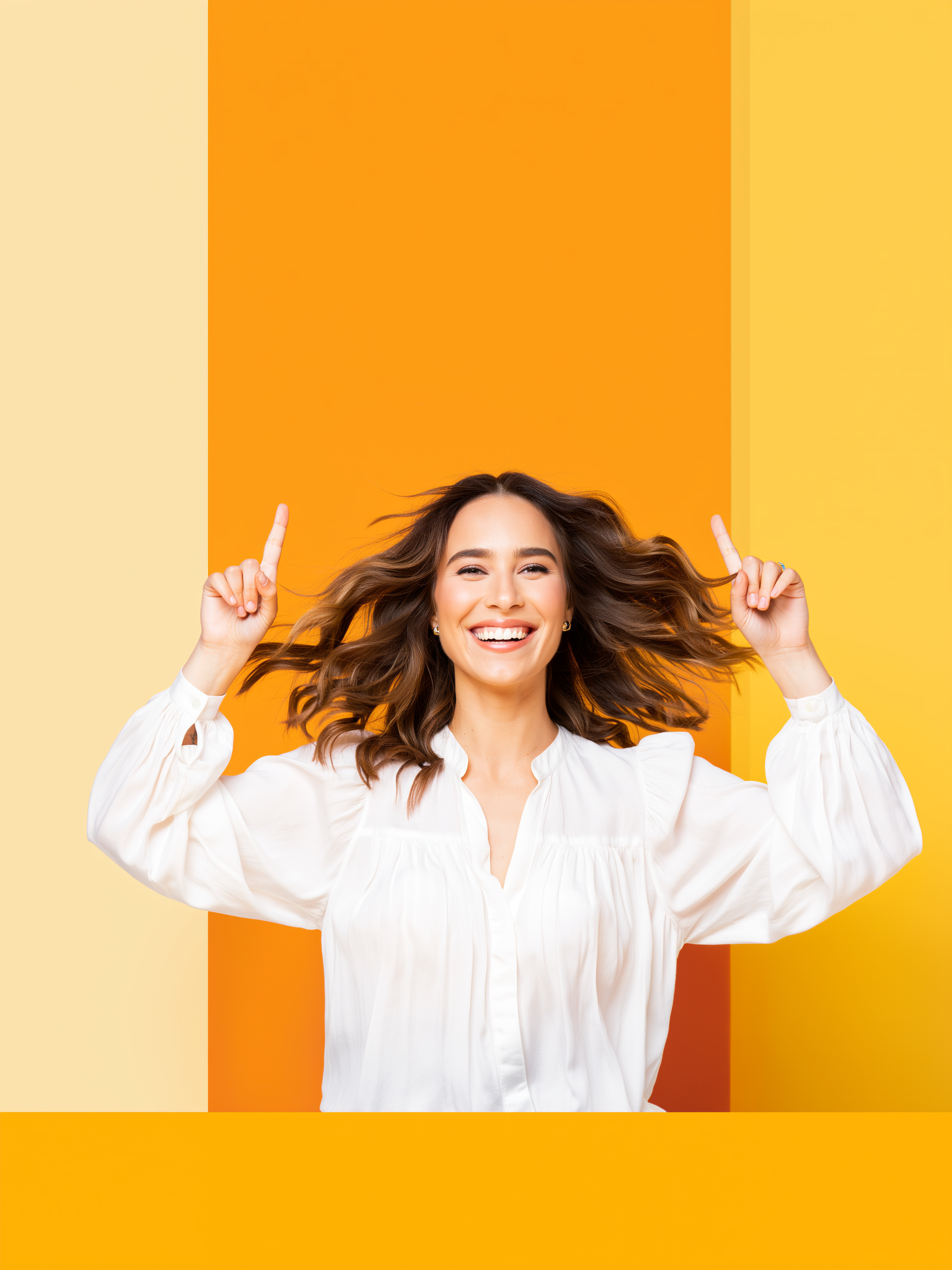 Happy girl celebrating on a golden orange background
